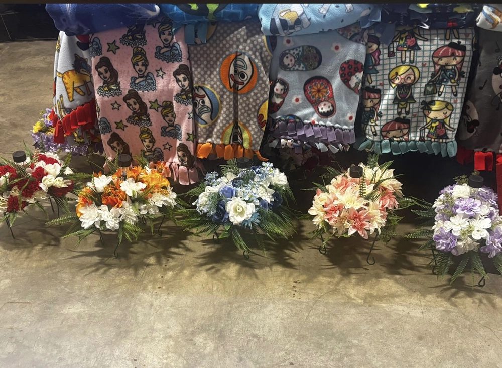 Grave saddles and printed pillows on display