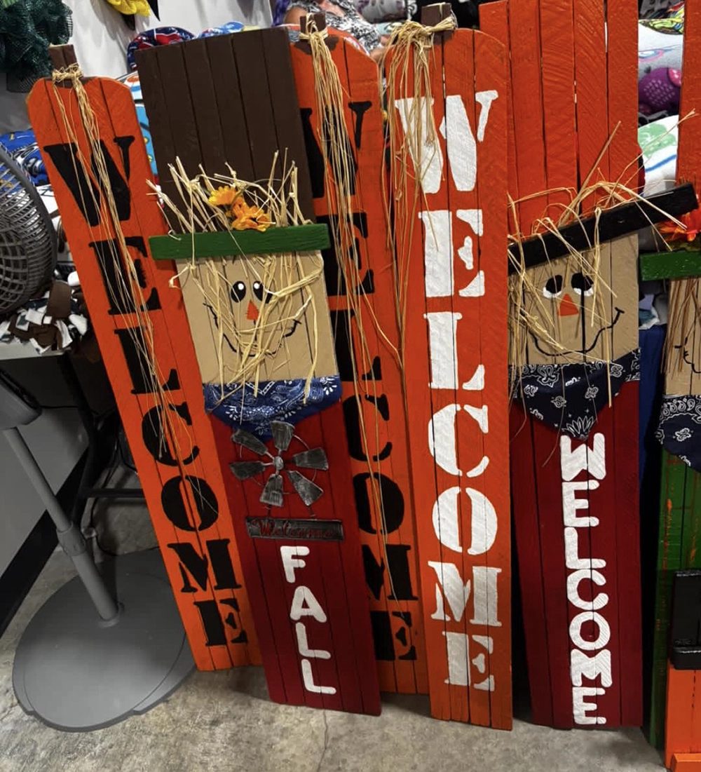 Painted fall welcome boards with scarecrows