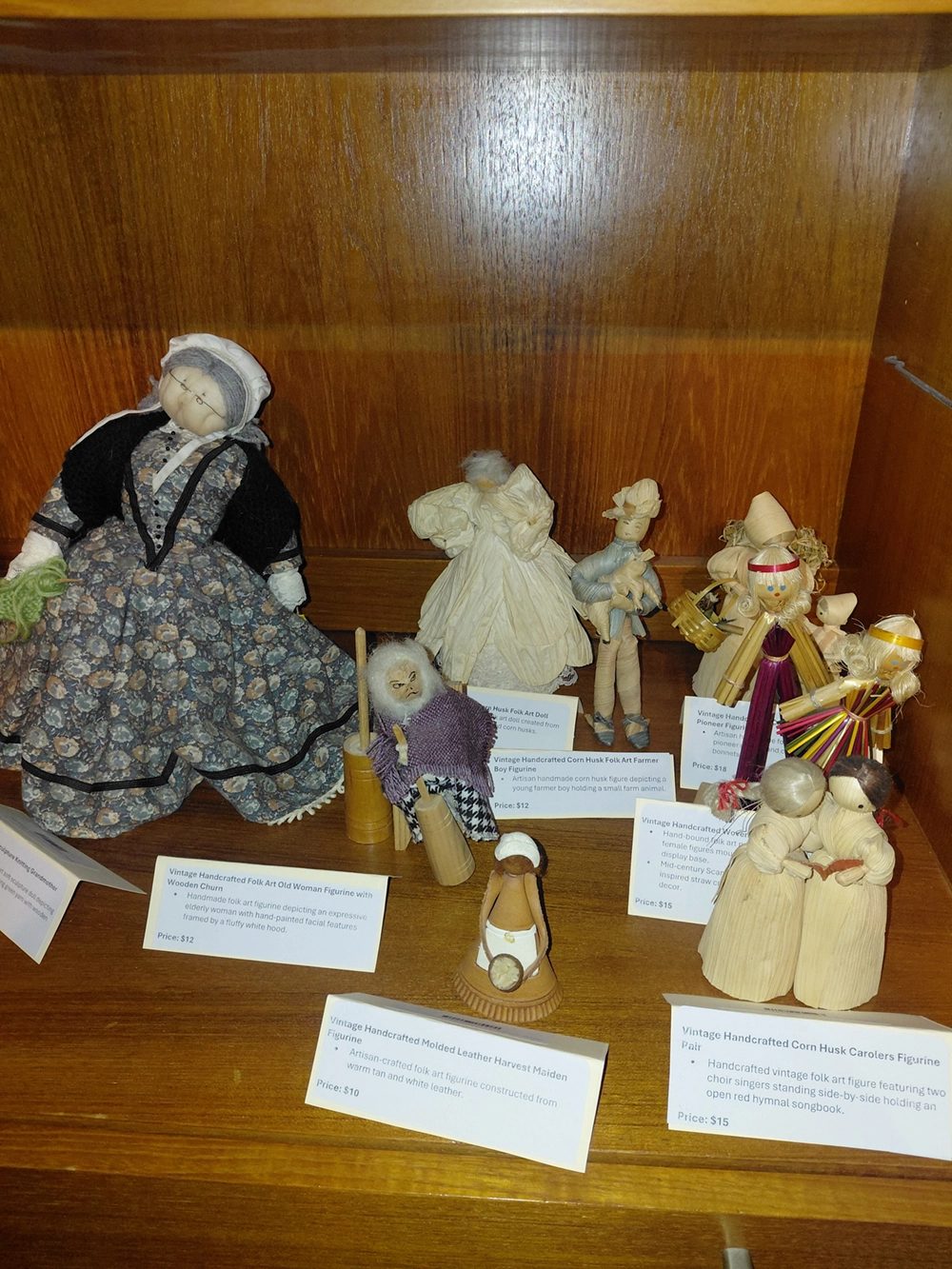Vintage dolls in a display case