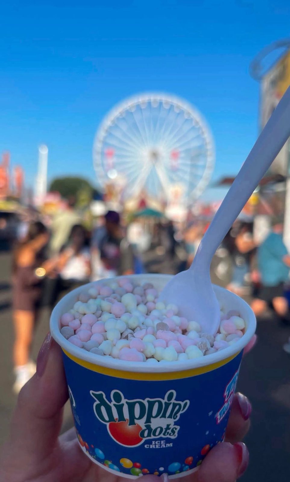 A cup of Dippin Dots at the fair