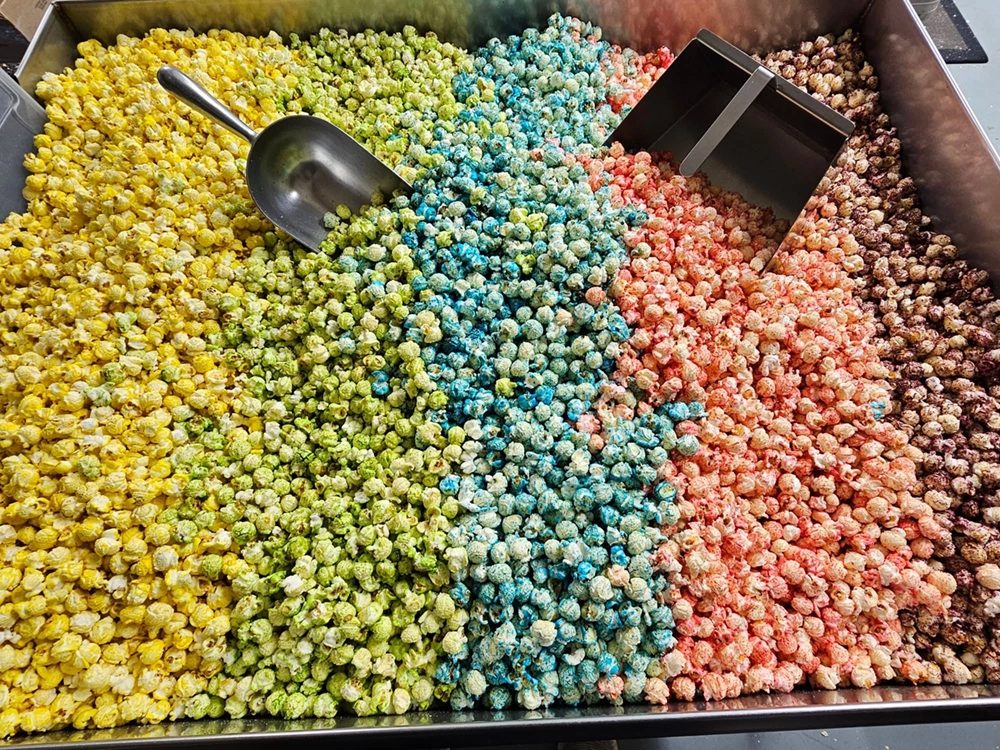 Trays of colourful gourmet popcorn